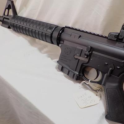 Ruger AR 556 semi auto rifle, 10 round, est. $300 to $900.