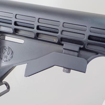 Ruger AR 556 semi auto rifle, 10 round, est. $300 to $900.