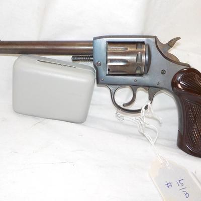 Model 55 Johnson target revolver, double action. 22 cal. est. $125 to $250.