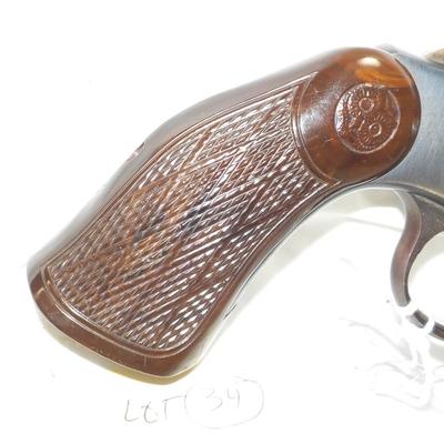 Model 55 Johnson target revolver, double action. 22 cal. est. $125 to $250.