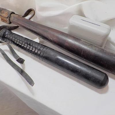 2 Vintage Police nite sticks. est. $20 to $100.