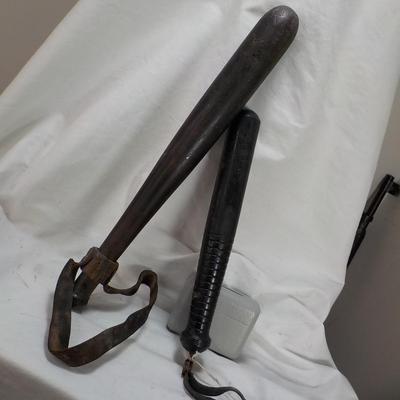 2 Vintage Police nite sticks. est. $20 to $100.