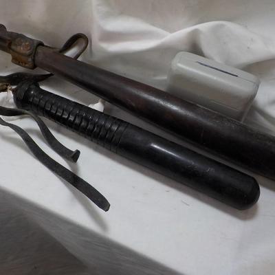 2 Vintage Police nite sticks. est. $20 to $100.