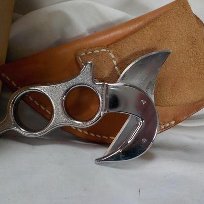 Pocket range finder and Pelting knife and holster. est. @0 to $50.