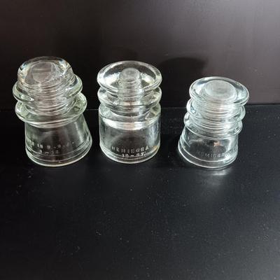 Three clear glass Hemingray Glass Insulators