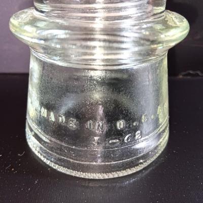 Three clear glass Hemingray Glass Insulators
