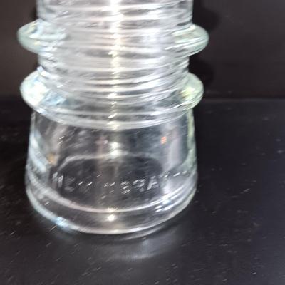 Three clear glass Hemingray Glass Insulators