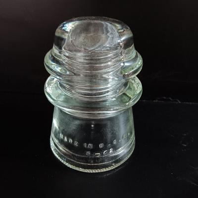 Three clear glass Hemingray Glass Insulators