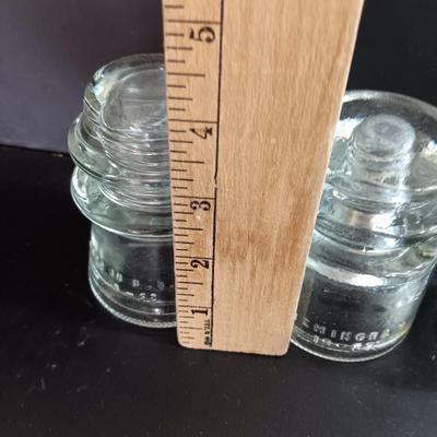 Three clear glass Hemingray Glass Insulators