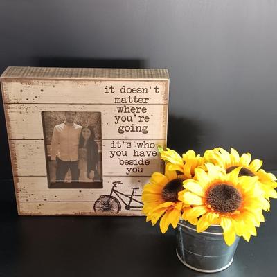 It doesn't matter where you're going it's who you have beside you photo frame with faux sunflowers.