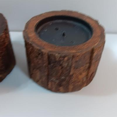 Three rustic wooden pillar candle holders
