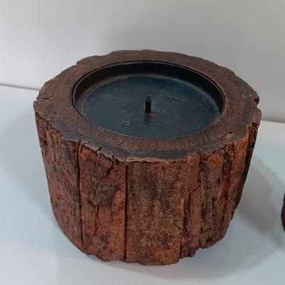 Three rustic wooden pillar candle holders