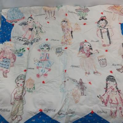 Antique Child's quilt hand stitched with people from different countries all over it