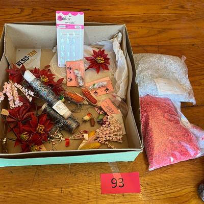 Box of Christmas crafting items
