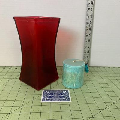 Red Glass Vase and Decorative Candle