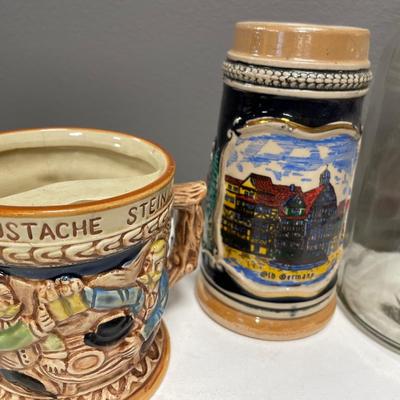 2 steins and 2 glass items