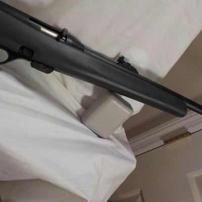 Remington model 597 , 22 LR. rifle w/ 6 shot magazine.est $125 to $220.