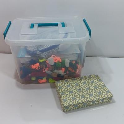 Multi Color Embroidery Floss / thread with crafting projects in a small plastic tote