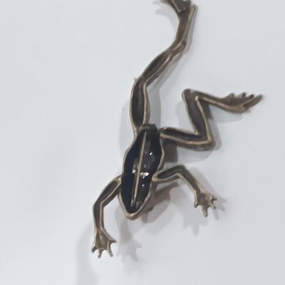 Brass frog with climbing brass frog brooch