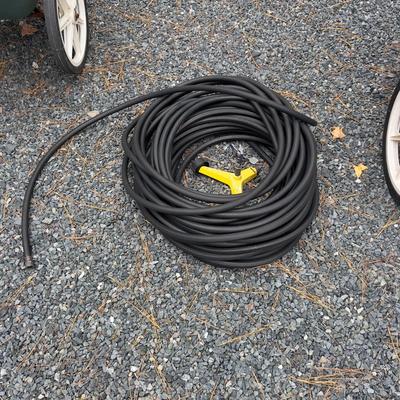 S2235. 175ft of Heavy Duty Hose with Sprinkler.