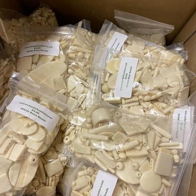 Shelf 59 Two Boxes of Bone Beads in Bags