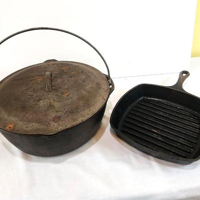 Lot #132  Two Cast Iron pieces - Dutch over with lid and Griddle