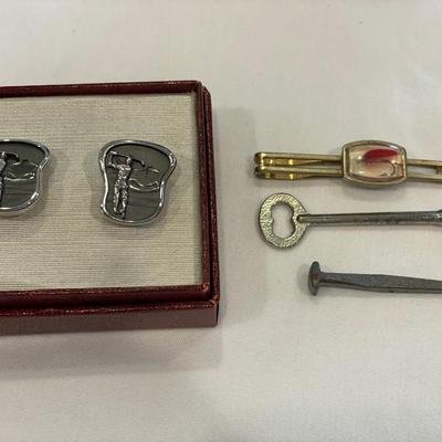 Tie clips, cuff links and key