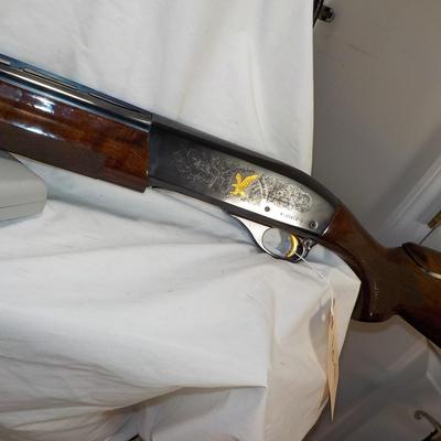 Remington 1100 12 gauge Skeet and sport shot gun. est. $300 to $1200.