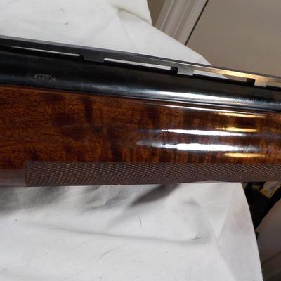 Remington 1100 12 gauge Skeet and sport shot gun. est. $300 to $1200.