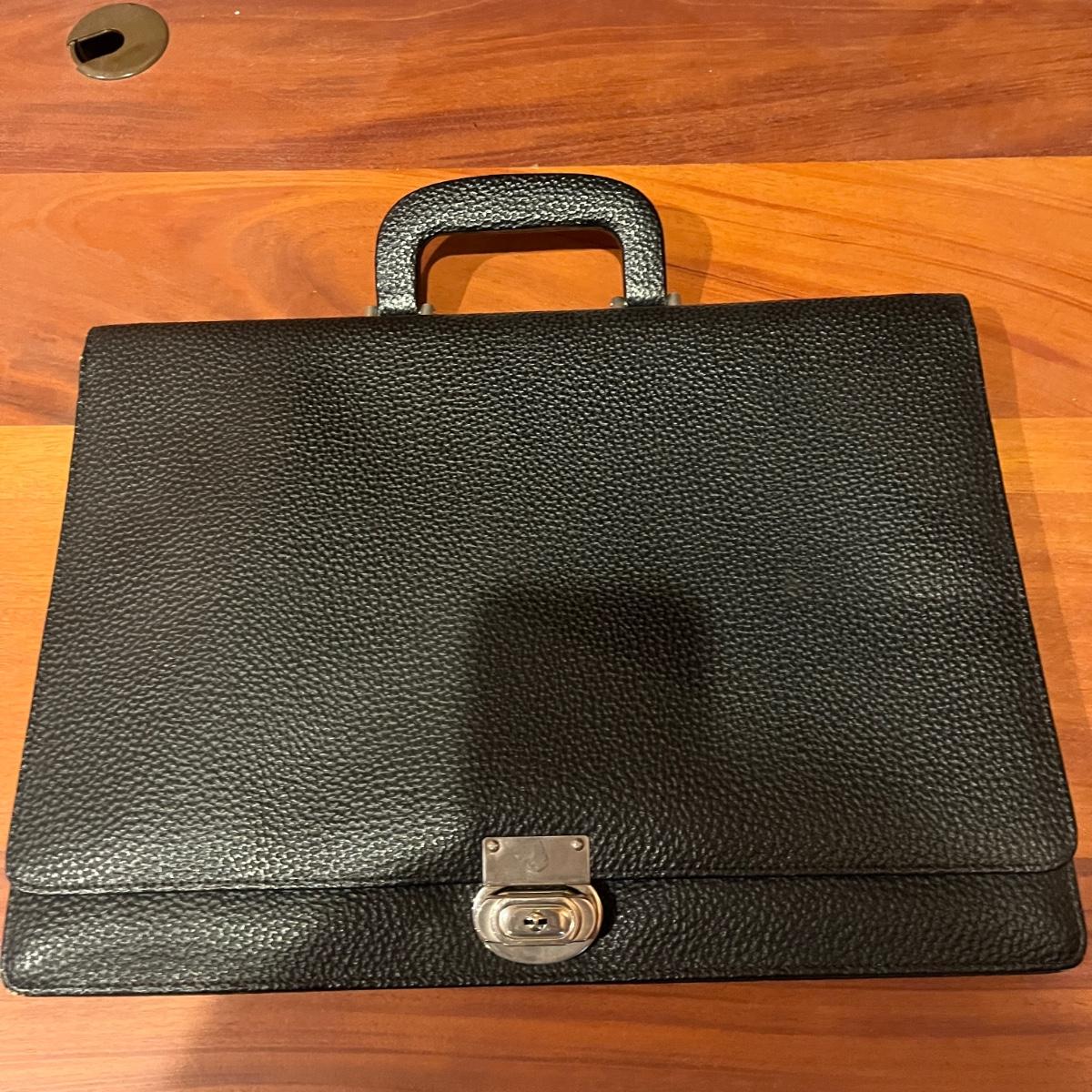 Tumi and Three More Leather Briefcases (OMG)