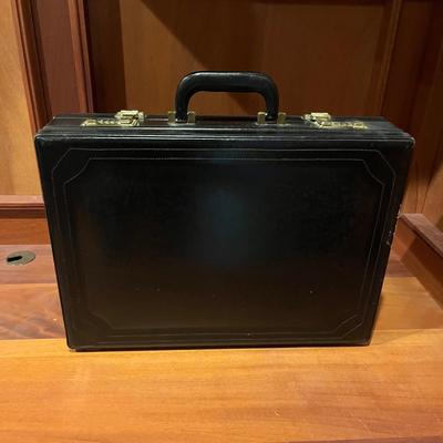 Tumi and Three More Leather Briefcases (O-MG)
