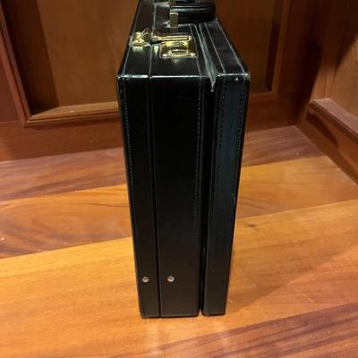 Tumi and Three More Leather Briefcases (O-MG)