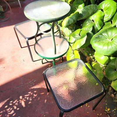 Lot #189  Group of 4 Tempered Glass Patio Tables