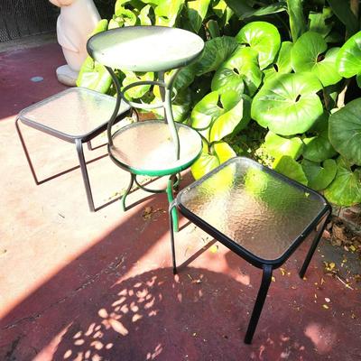 Lot #189  Group of 4 Tempered Glass Patio Tables