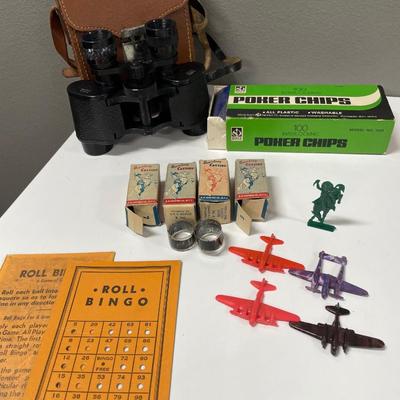 Binoculars, poker chips & plastic planes