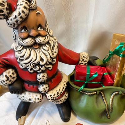 Ceramic Santa with golfing ornaments