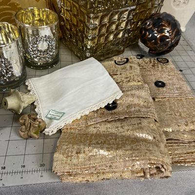 Decorative Items: Candles, Vase, Linens