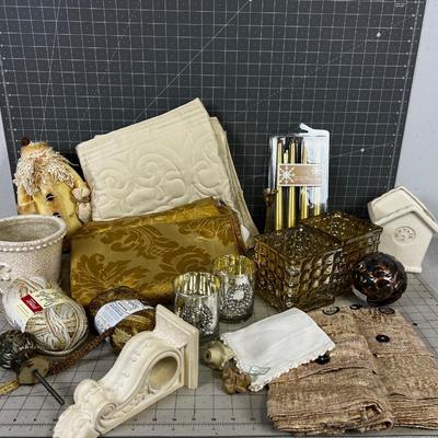 Decorative Items: Candles, Vase, Linens