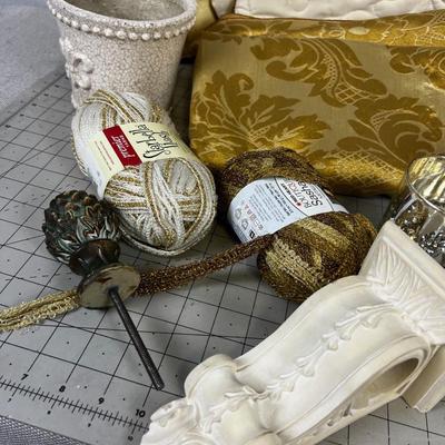 Decorative Items: Candles, Vase, Linens