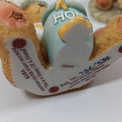 Four Collectible Cherished Teddies Teddy bears