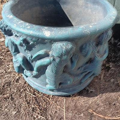Cement flowerpot with cherubs and a angel garden art piece