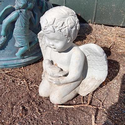Cement flowerpot with cherubs and a angel garden art piece