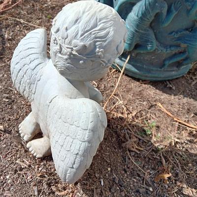 Cement flowerpot with cherubs and a angel garden art piece