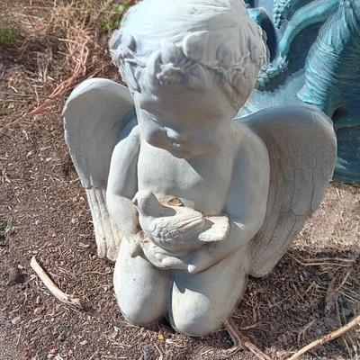 Cement flowerpot with cherubs and a angel garden art piece