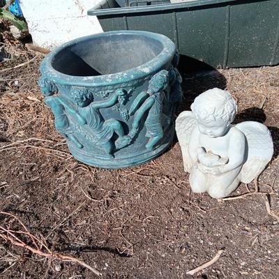 Cement flowerpot with cherubs and a angel garden art piece