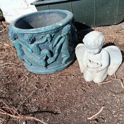 Cement flowerpot with cherubs and a angel garden art piece