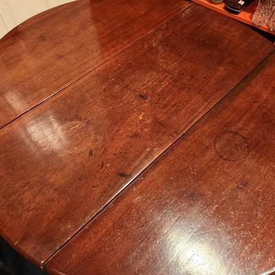 Lot #214  Antique Drop Leaf Table - good working condition