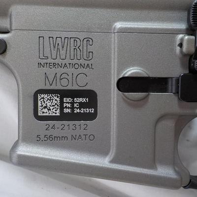 LWRC / AR-15 direct impingement Rifle 5.56 mm Nato./ est. $400 to $1200.
