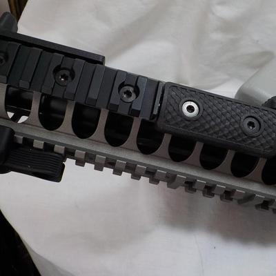 LWRC / AR-15 direct impingement Rifle 5.56 mm Nato./ est. $400 to $1200.