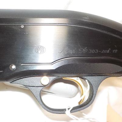 Beretta Angle port Class A-303  shot gun, 12 gauge 3in, est. $300 to $1200.